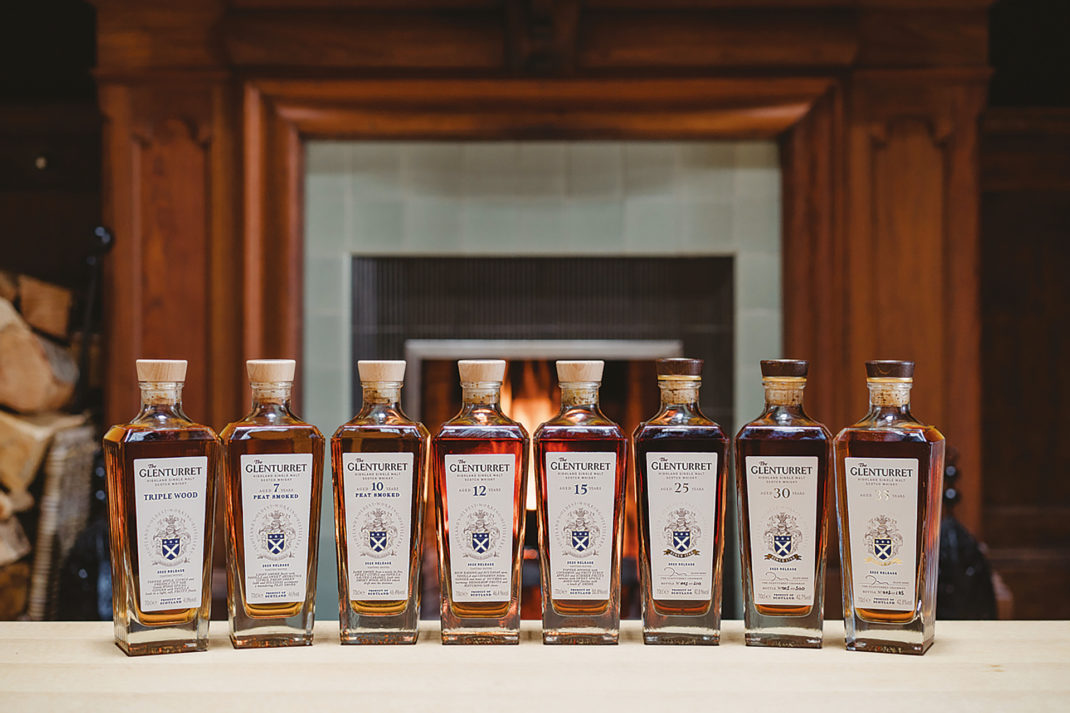 Bottles of The Glenturret Distillery drinks lined up
