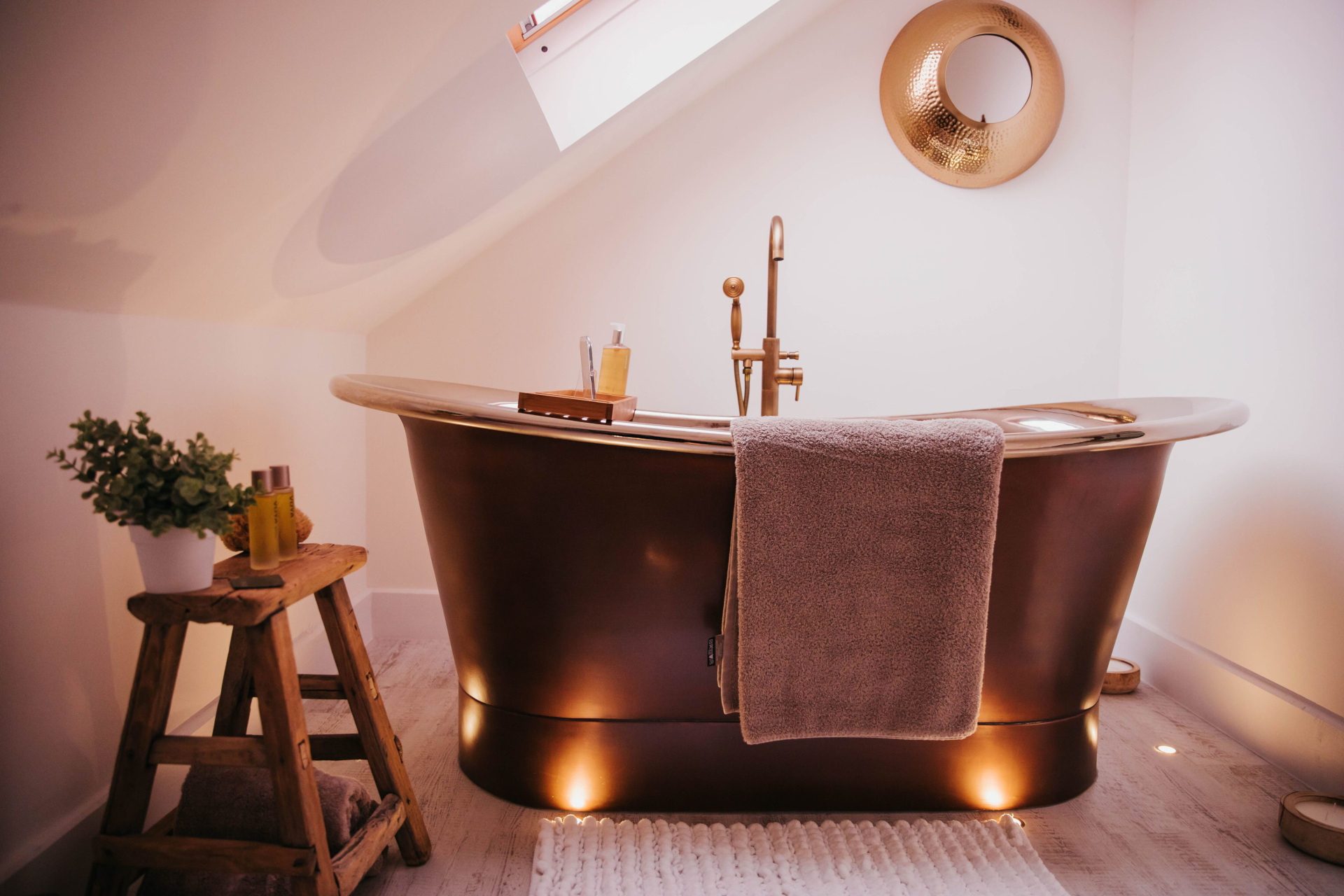 Copper bath in low lit room