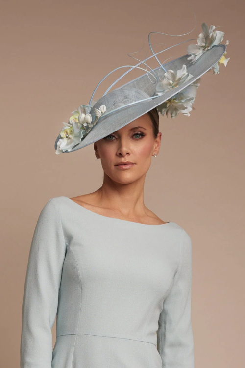 Woman wearing blue fascinator