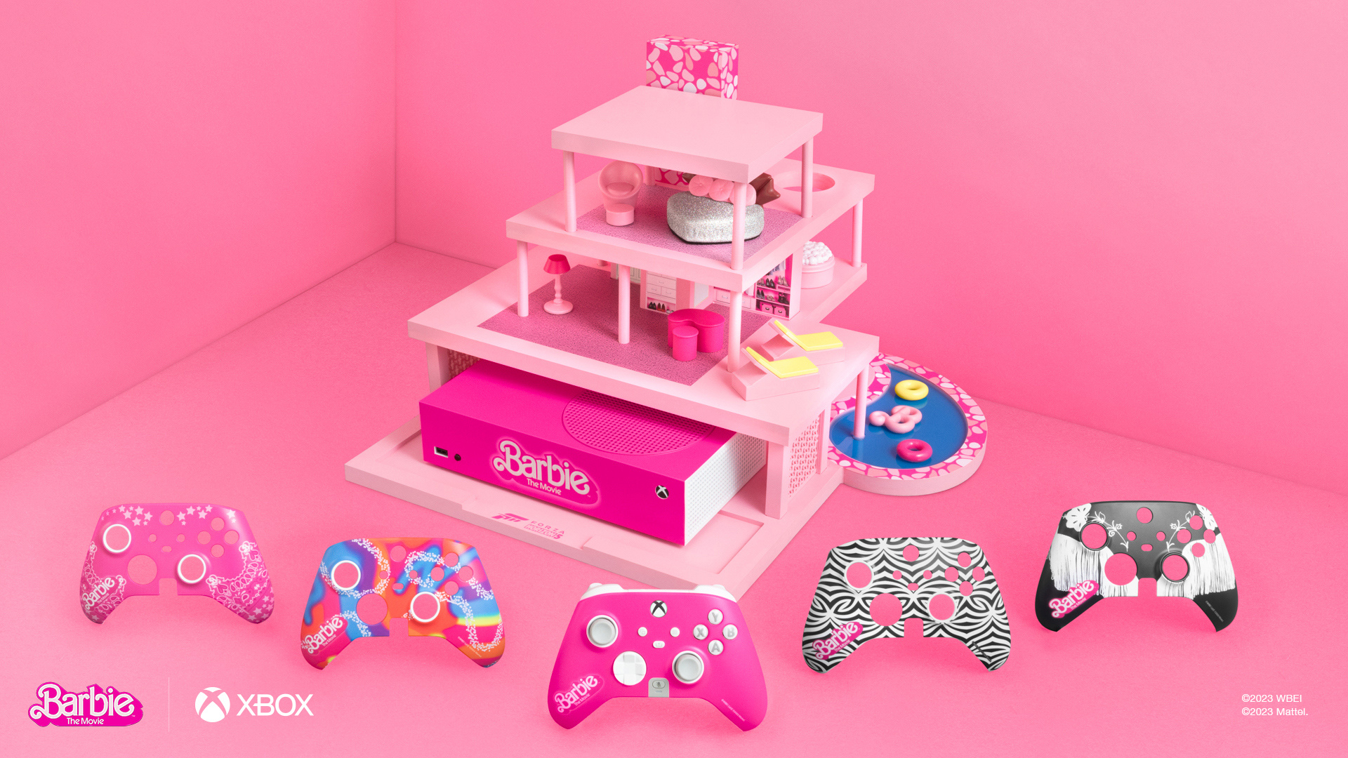 Pink Barbie Xbox console and controllers