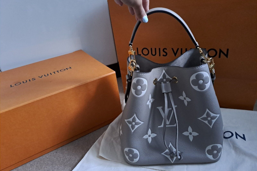 Grey Louis Vuitton bag with orange box