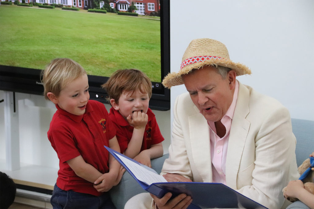 Actor Hugh Bonneville reading an extract from Paddington Bear as he officially opened the Nursery extension