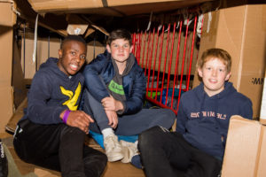 Pupils in the shelters they constructed for the night