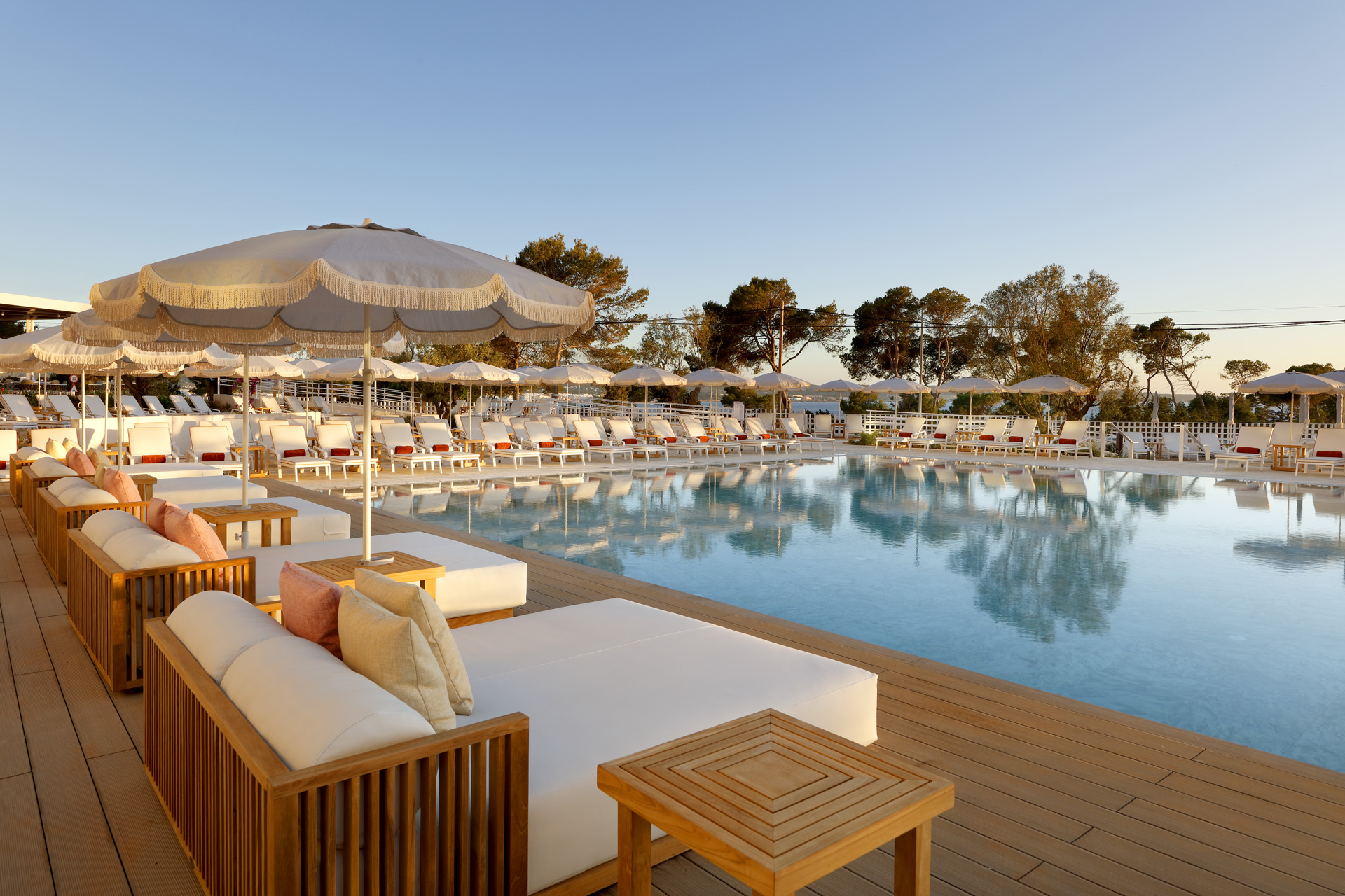 Sunbeds around the swimming pool at TRS Ibiza Hotel