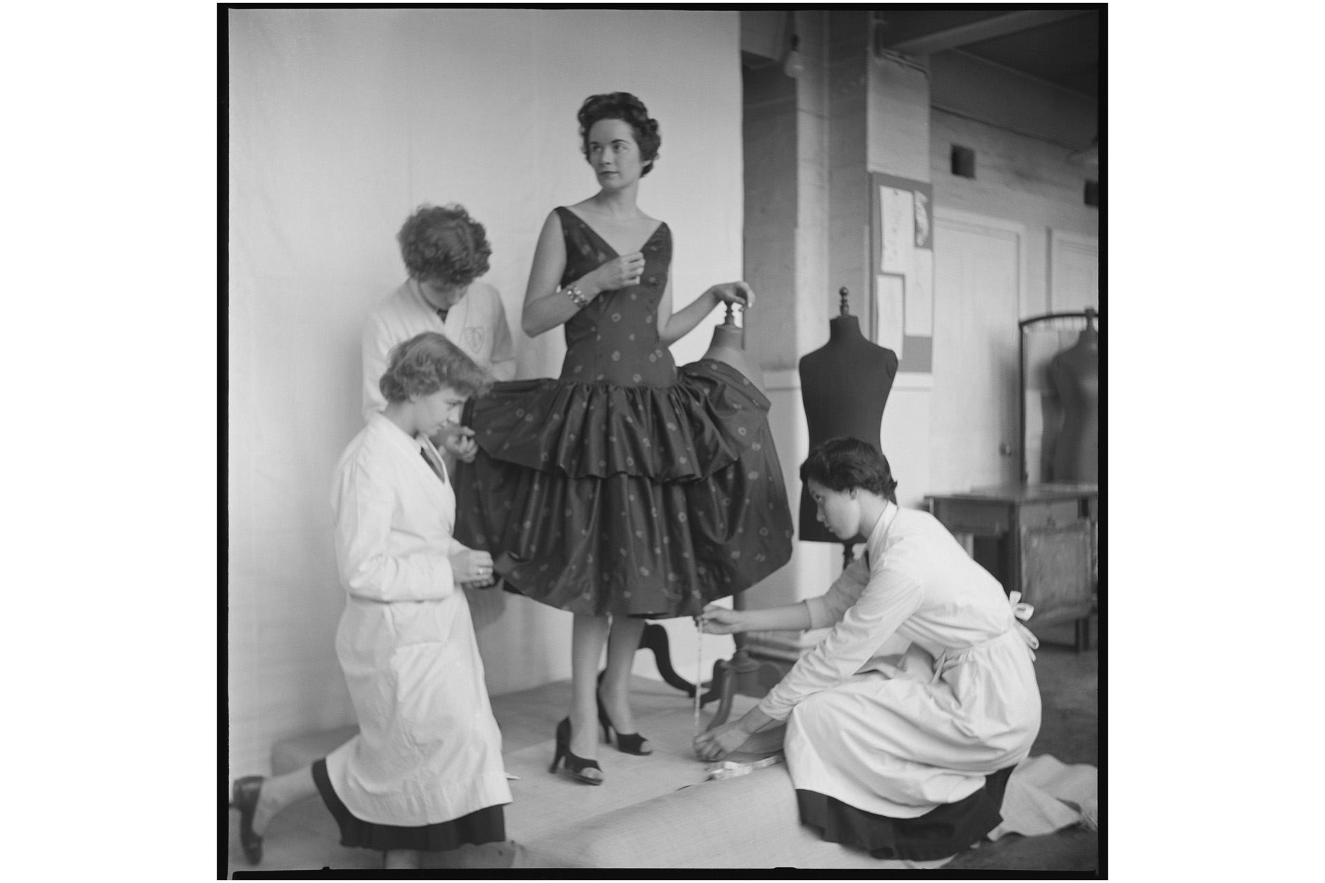 Fashion City: A model poses for a fitting in a dress at Shoreditch College