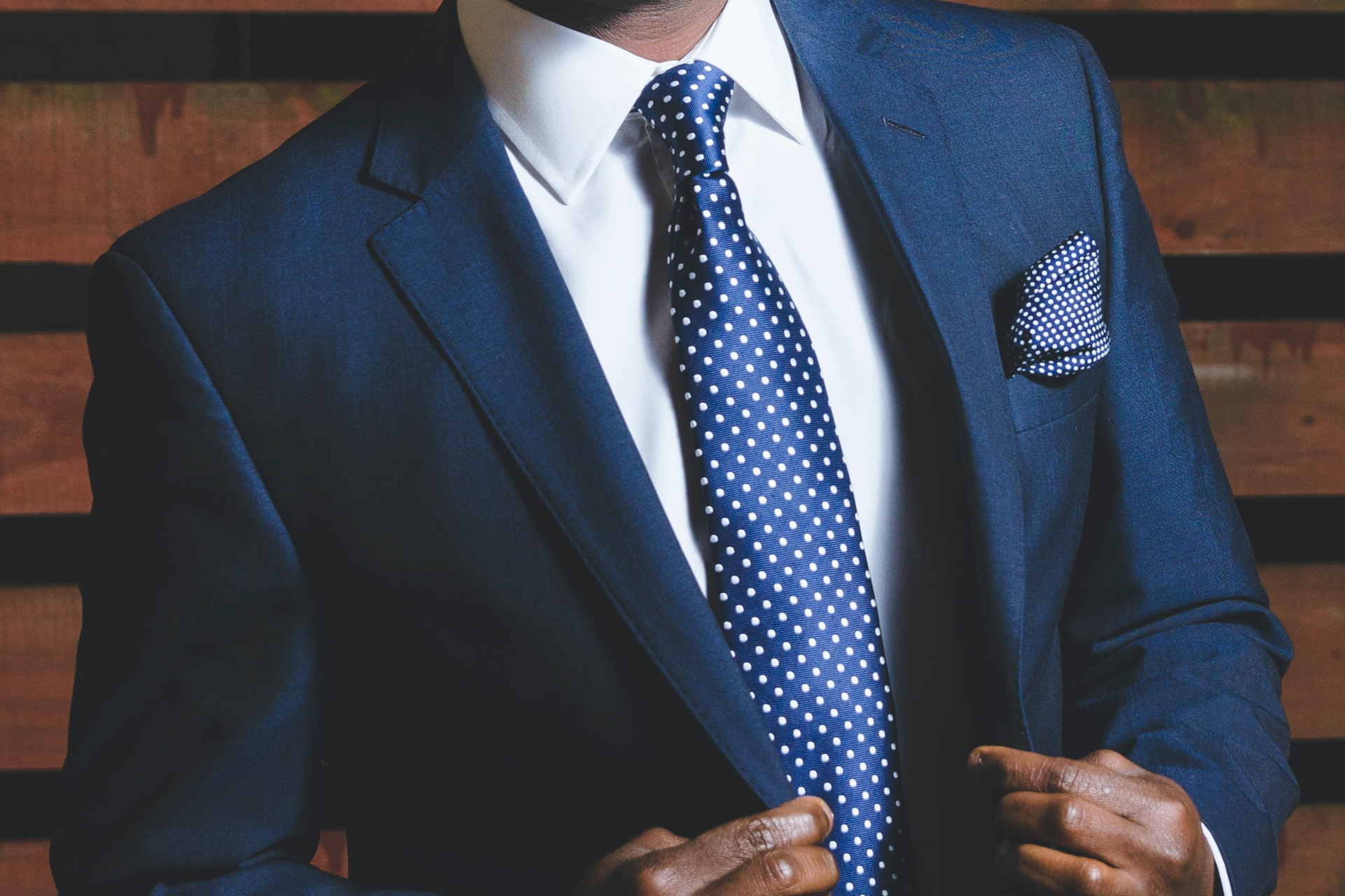 Close up of man in a navy suit