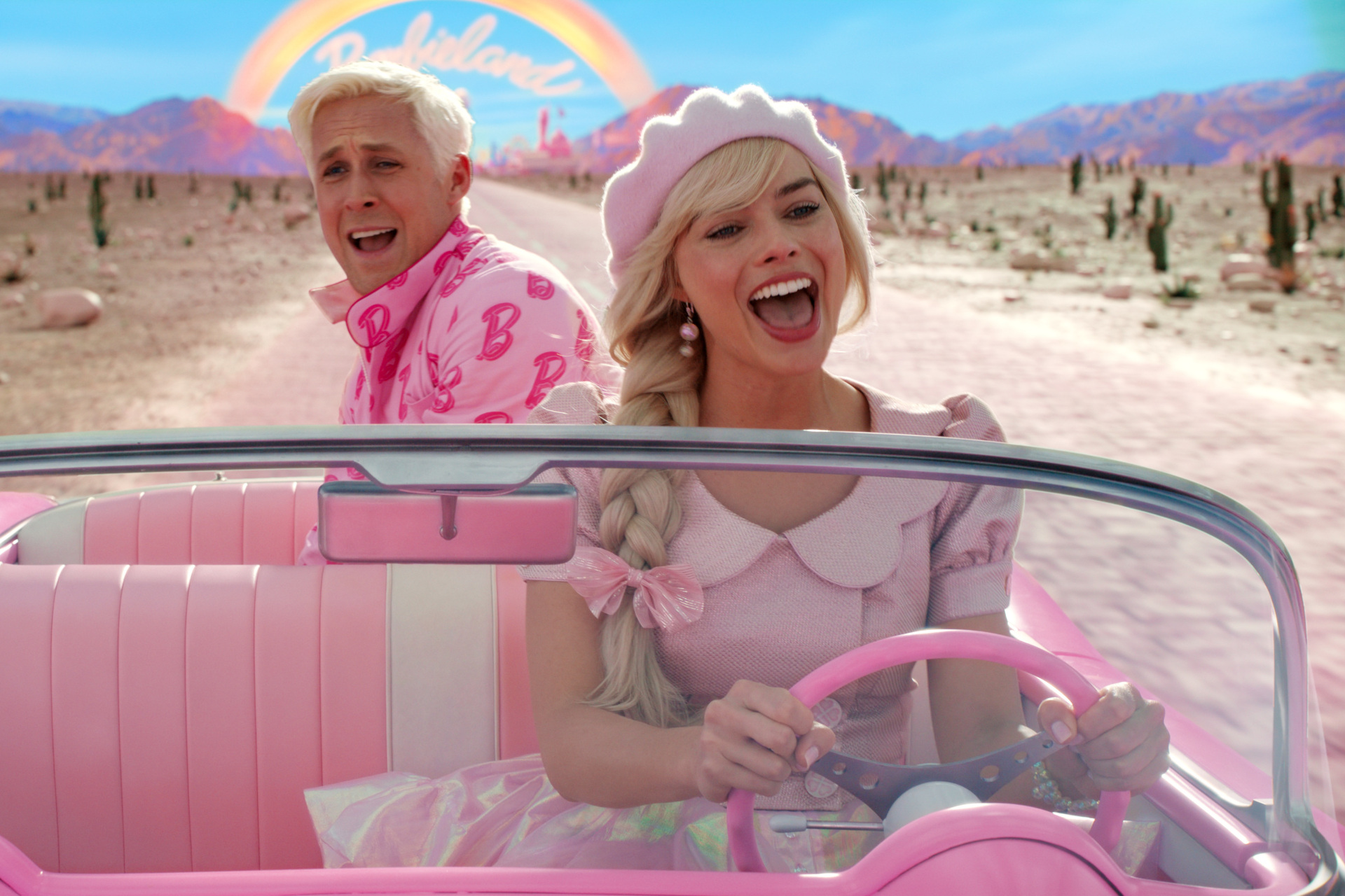 (L-r) RYAN GOSLING as Ken and MARGOT ROBBIE as Barbie