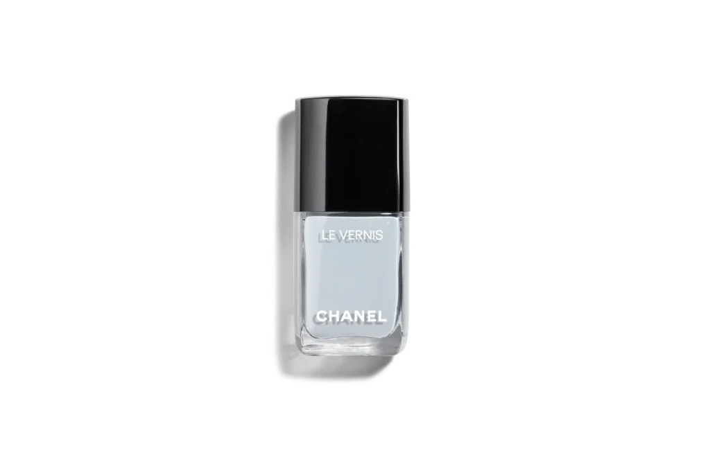 Blue nail varnish bottle with black lid