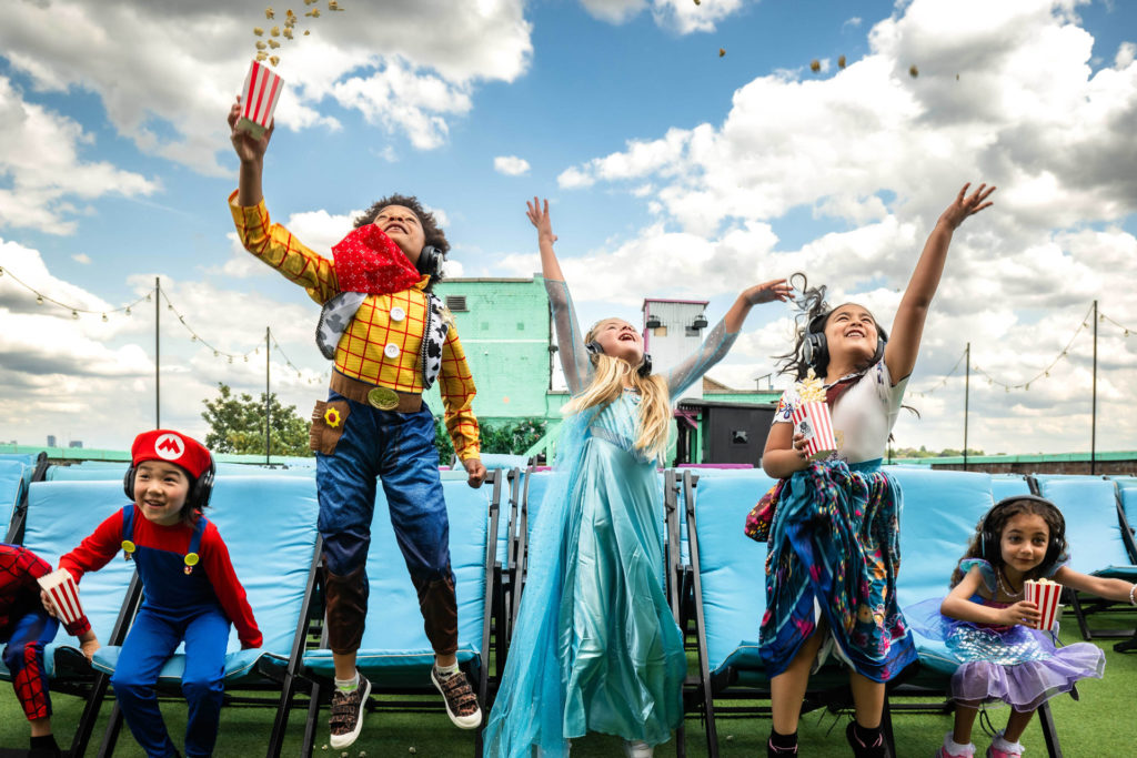 Kids celebrating summer at Rooftop Film Club