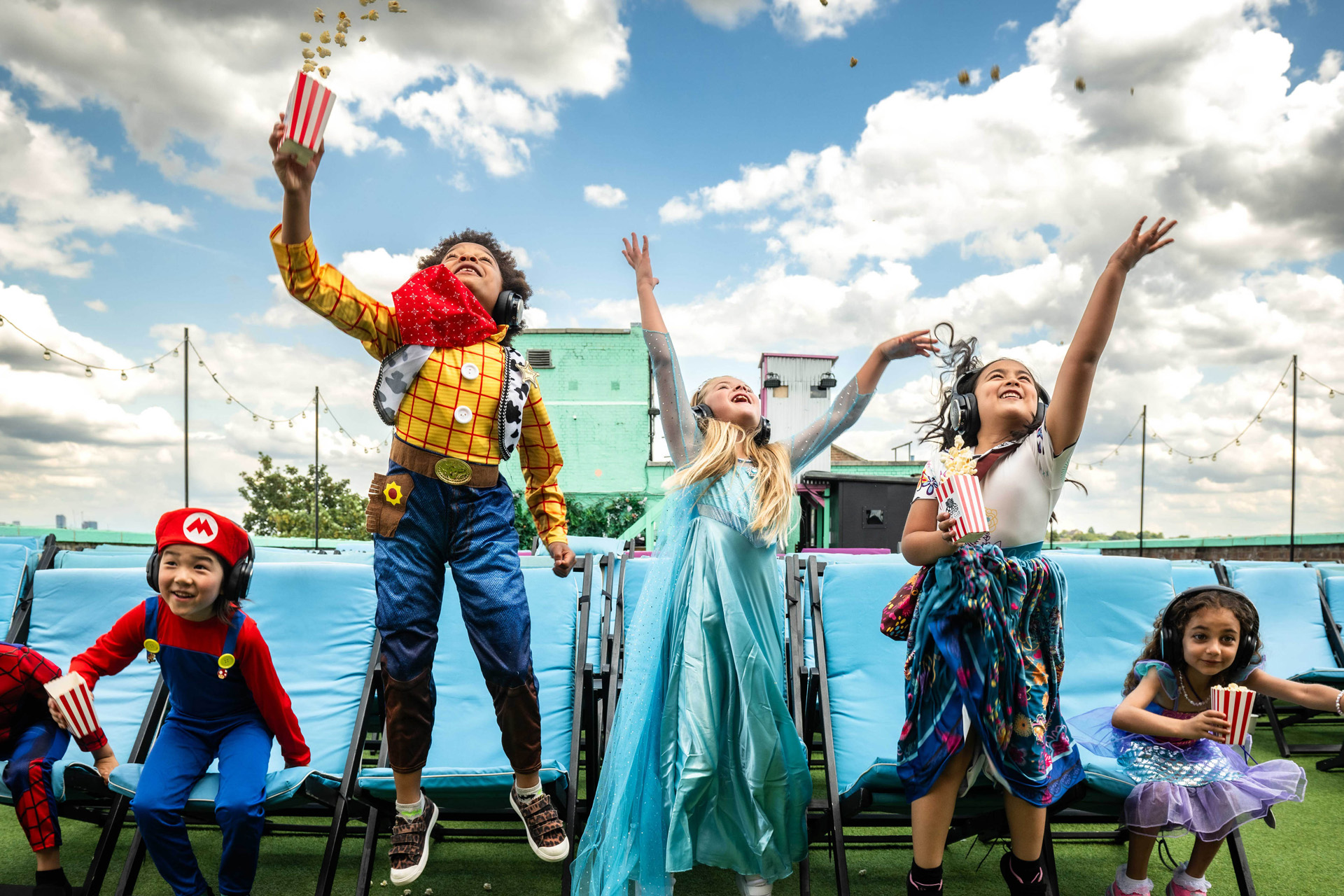 Kids celebrating summer at Rooftop Film Club