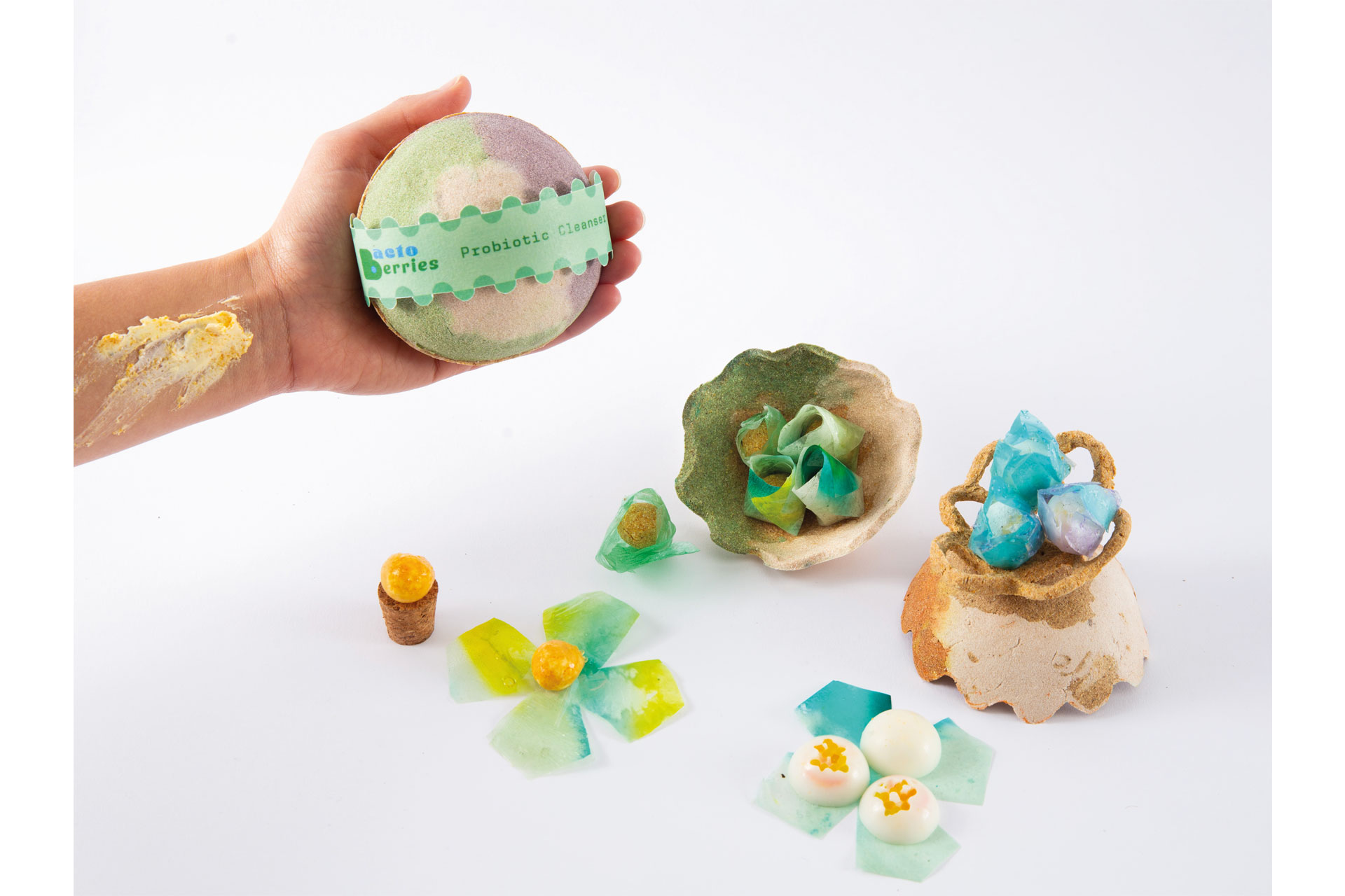 Cleaning products - one is held in the palm of a hand