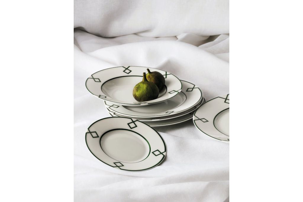 Plates set on white bedding