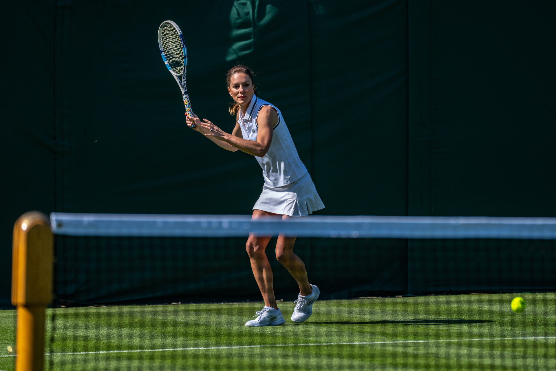 Kate Middleton playing tennis