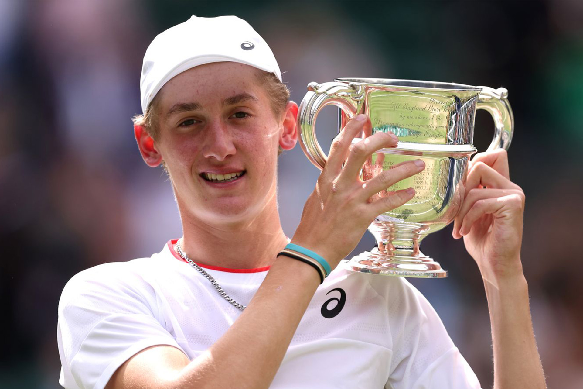 Henry Searle holding his trophy