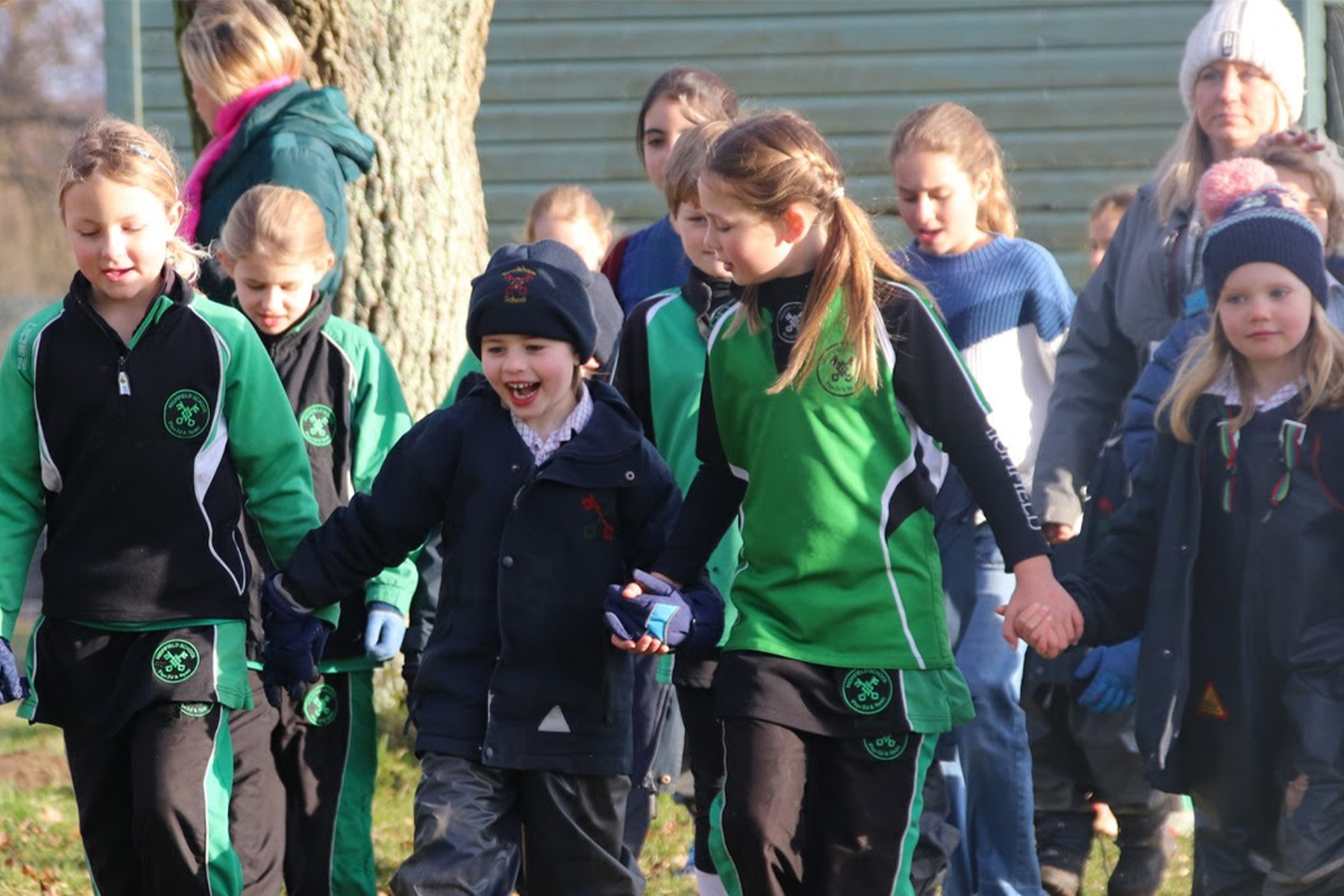 Highfield and Brookham pupils having fun together outdoors