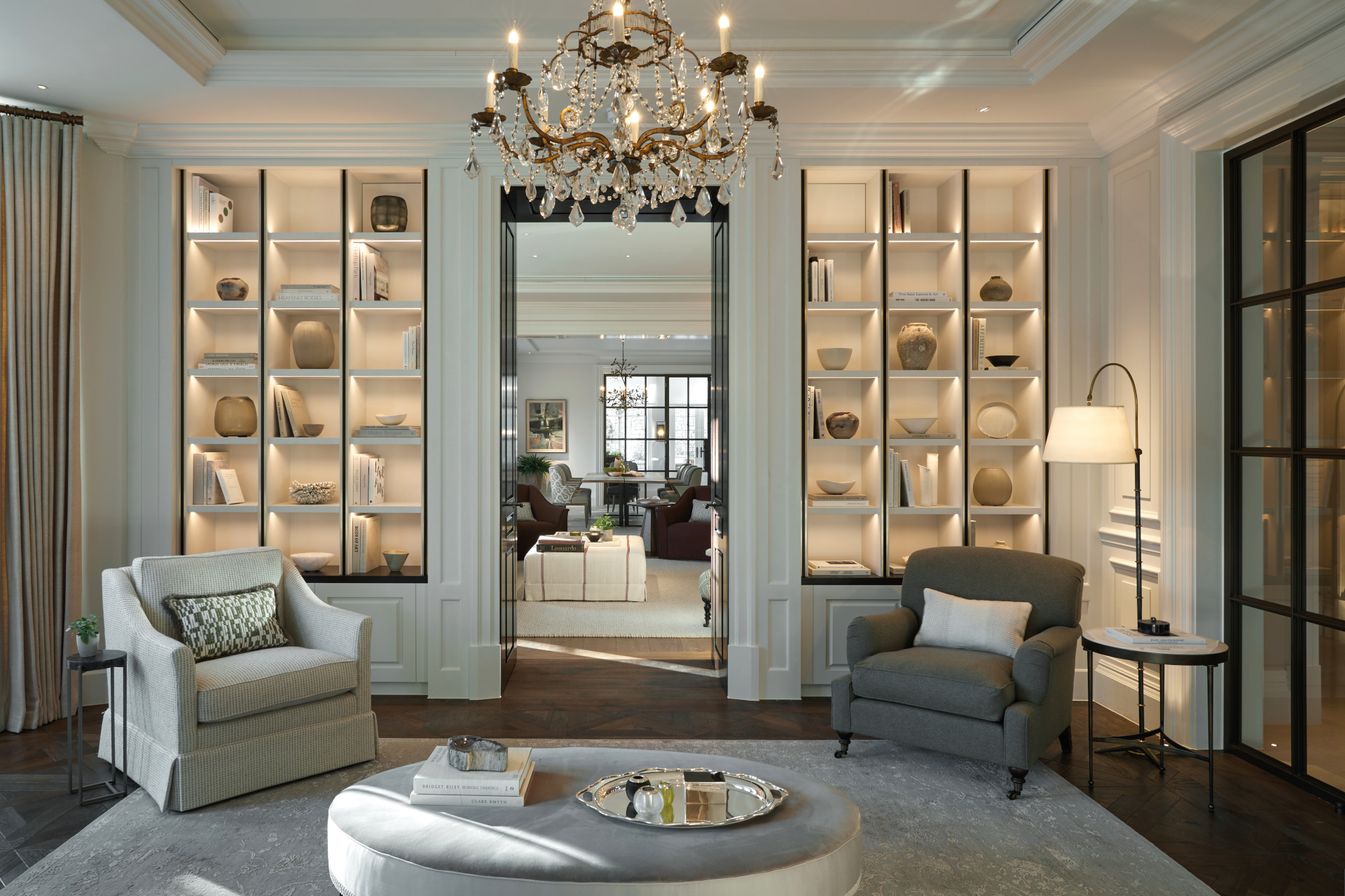 Living room with lit up display shelving