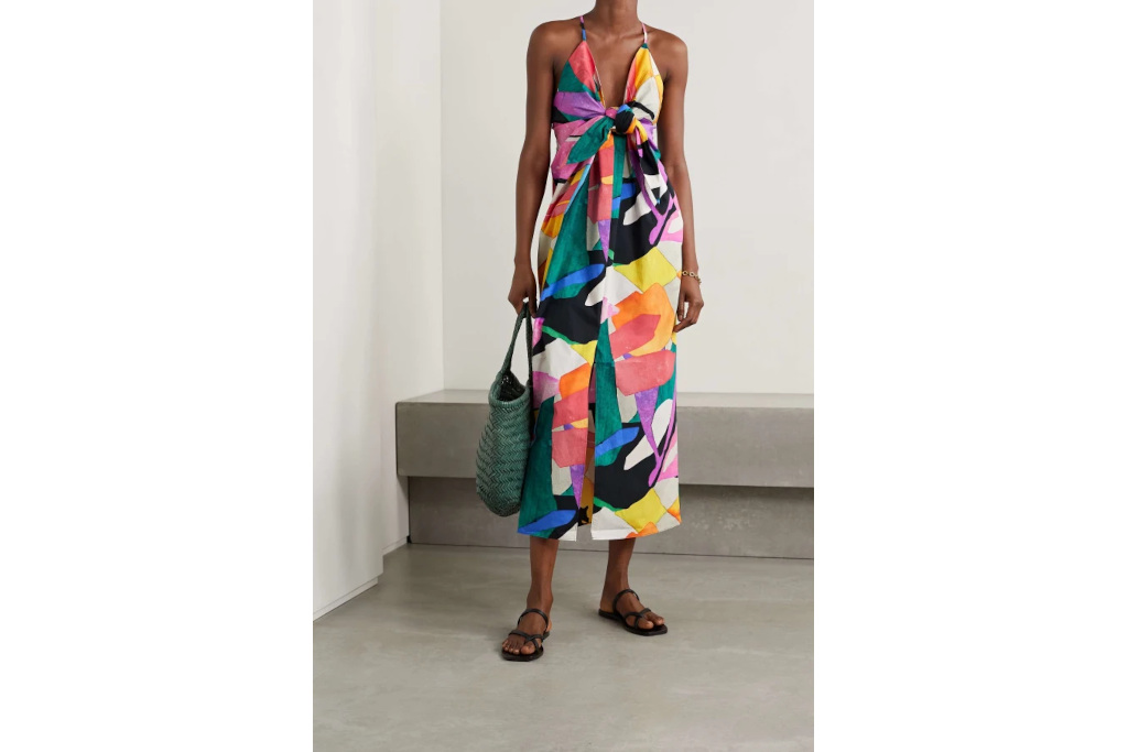 Woman in colourful print dress