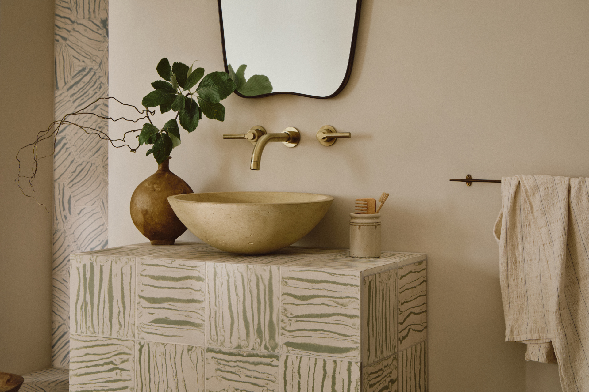 Bathroom counter with artsy tiles
