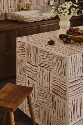 Kitchen island with artsy tiles