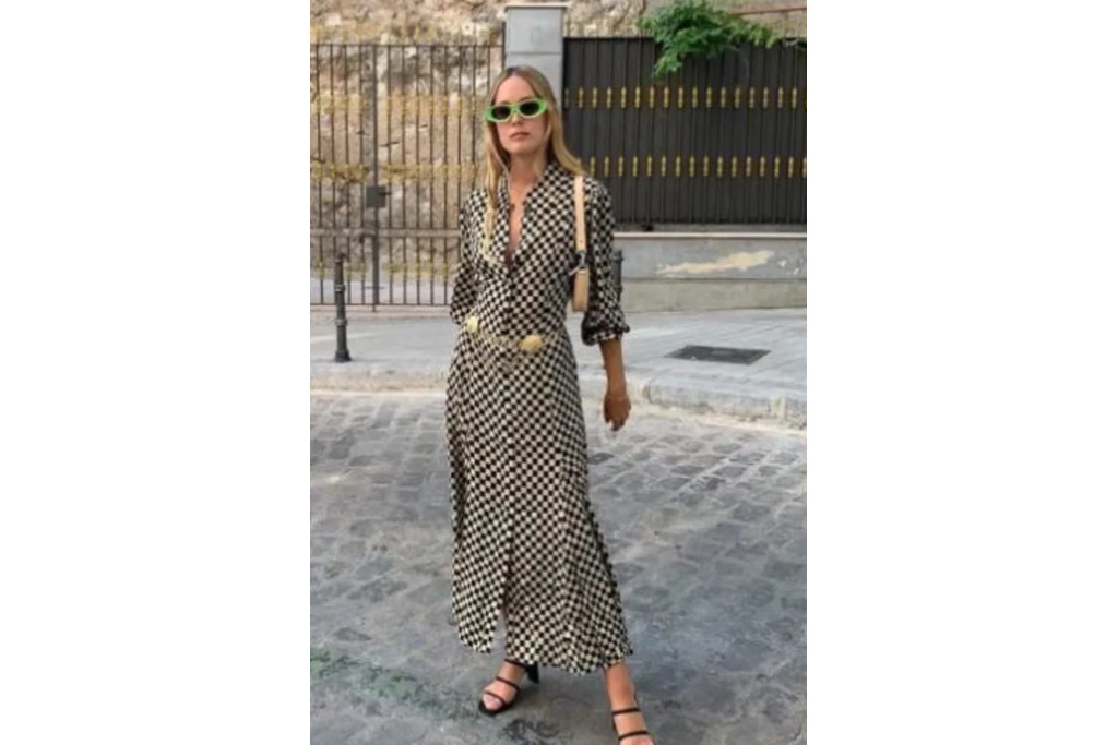 Woman in check dress