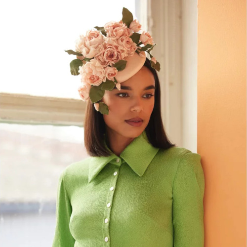 Woman in floral headpiece | british hat brands