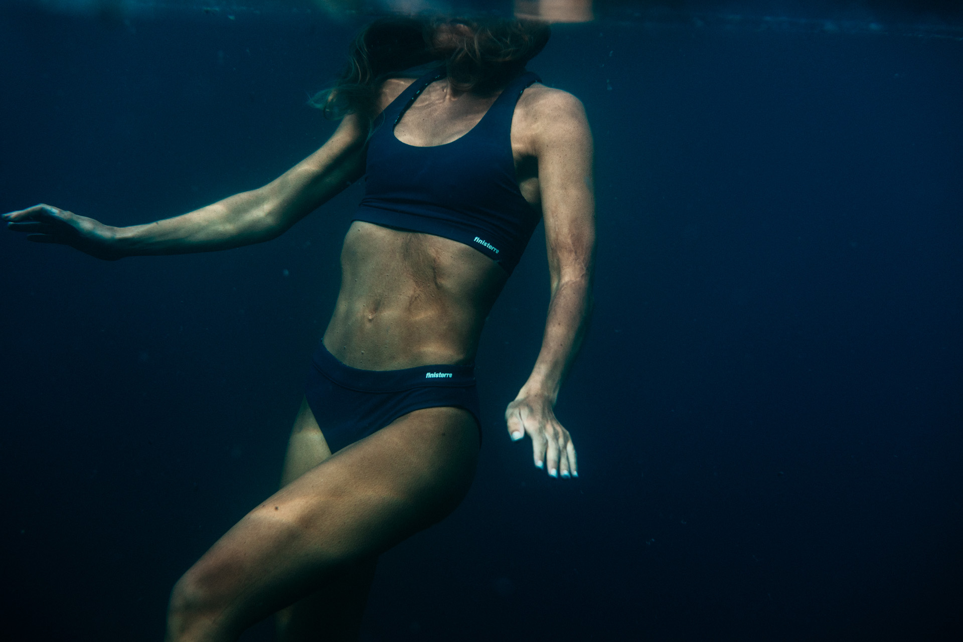 A shot of someone swimming underwater