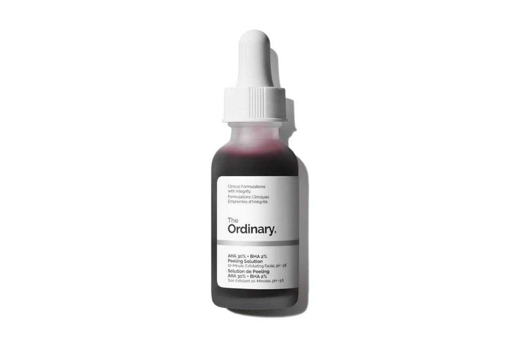 Purple serum bottle with white stopper