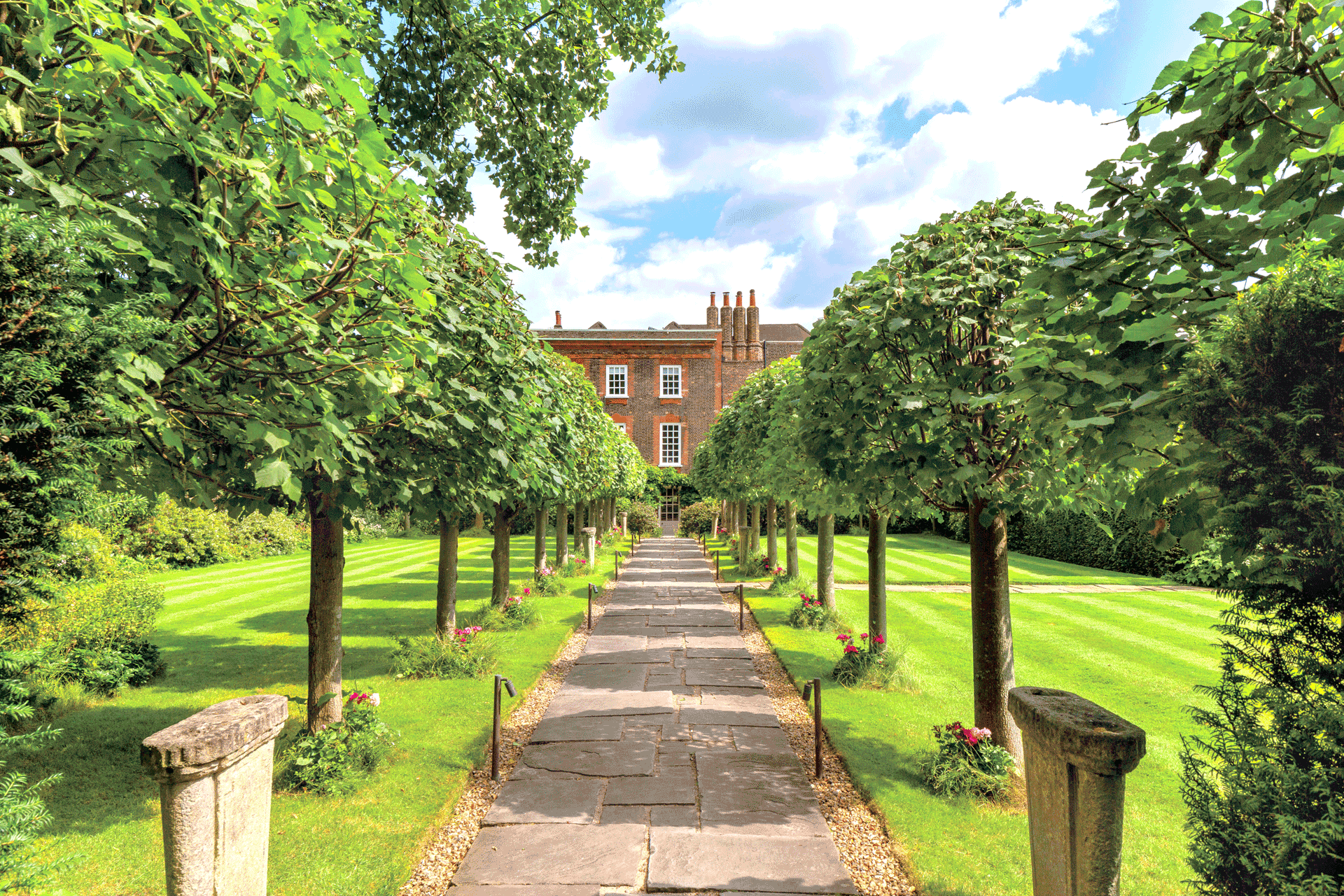 Grounds of Walpole House, featuring a long tree-lined drive