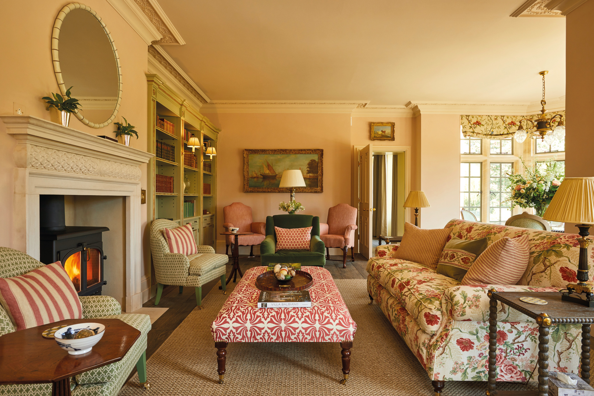 Pink and blush sitting room with plush furniture