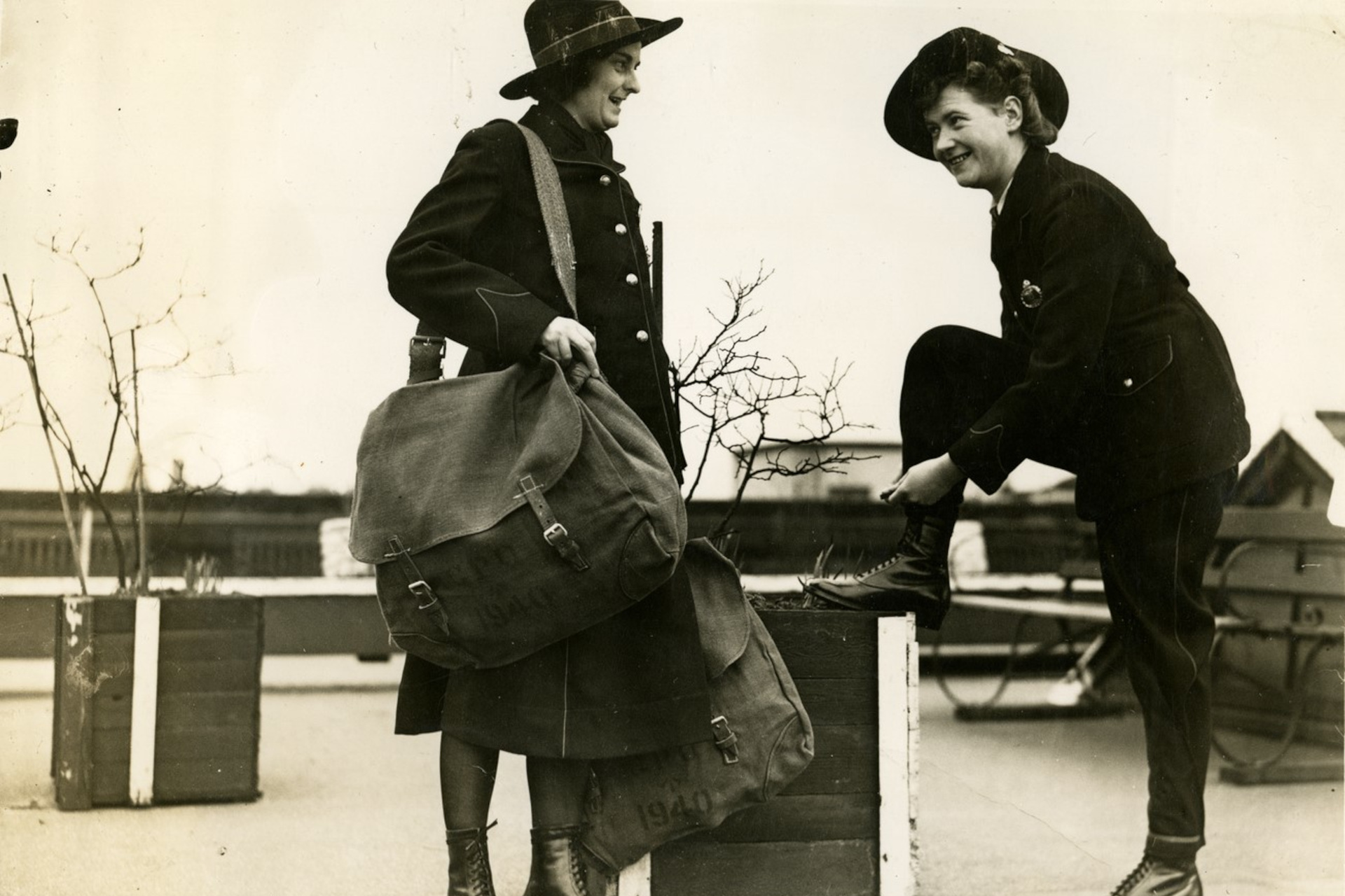 Postwomen, one of whom is wearing 'Camerons'