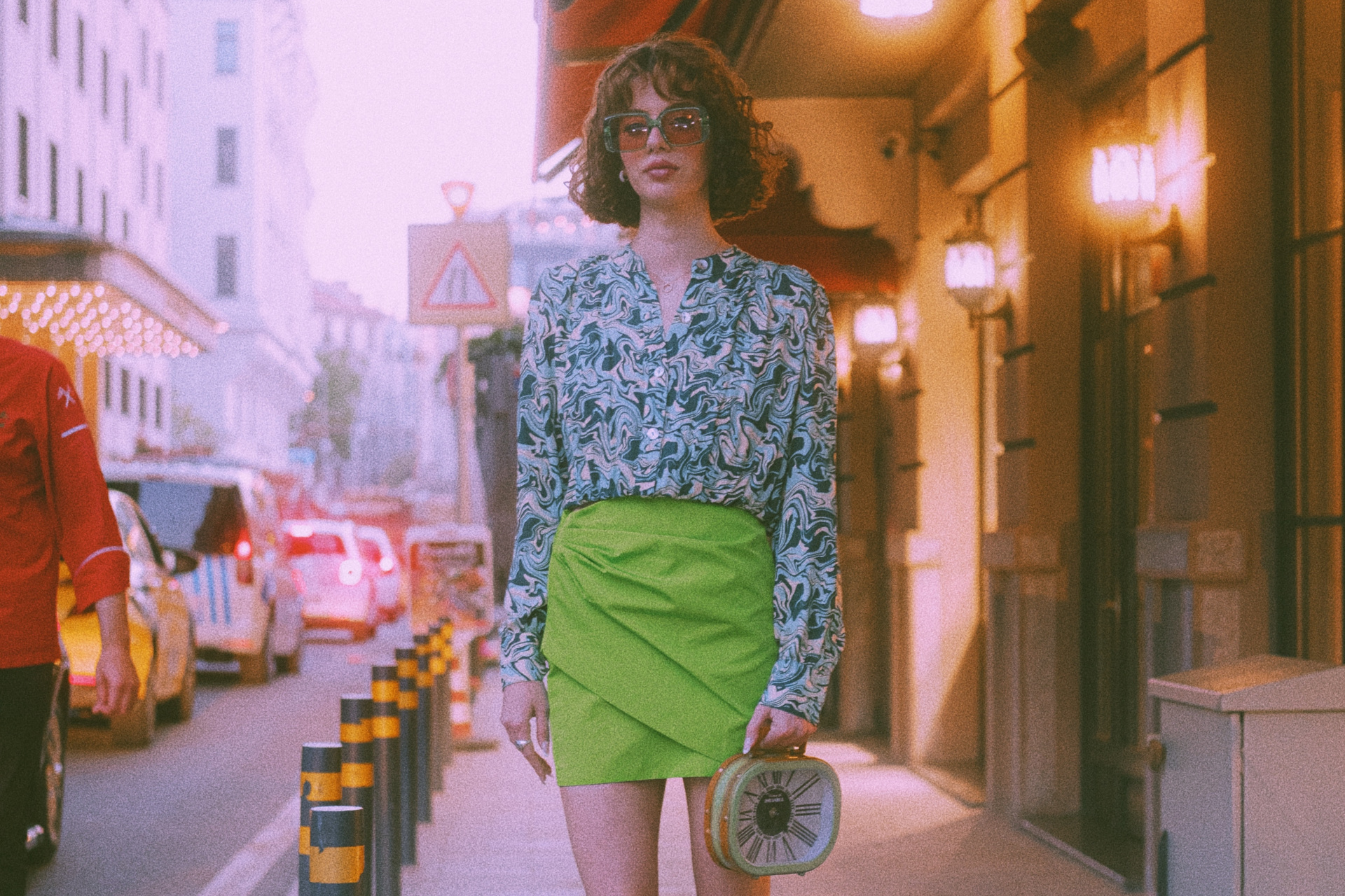 Woman in 60s fashion inspired blouse and mini skirt