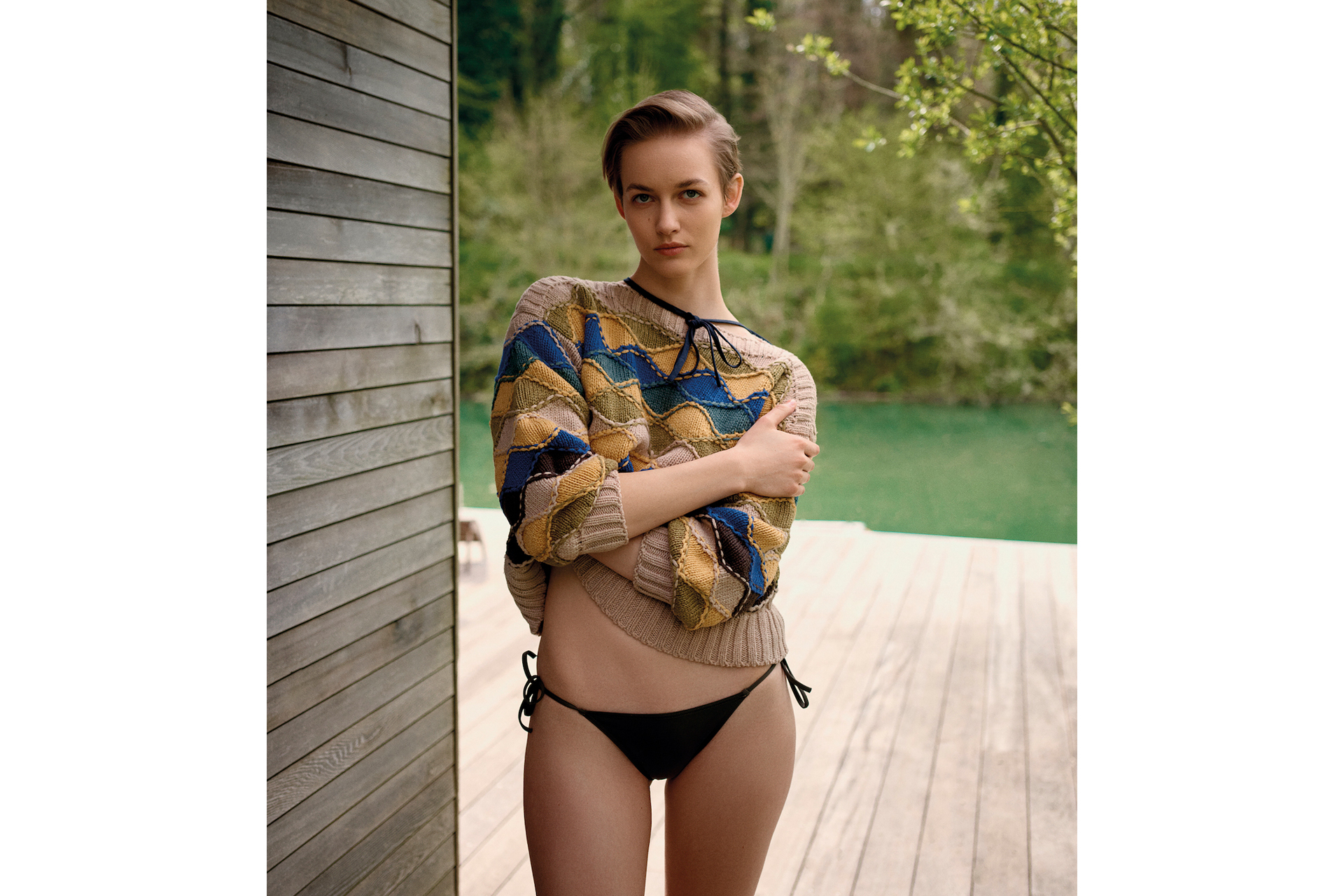 model in bikini bottoms and jumper in c&th spa shoot