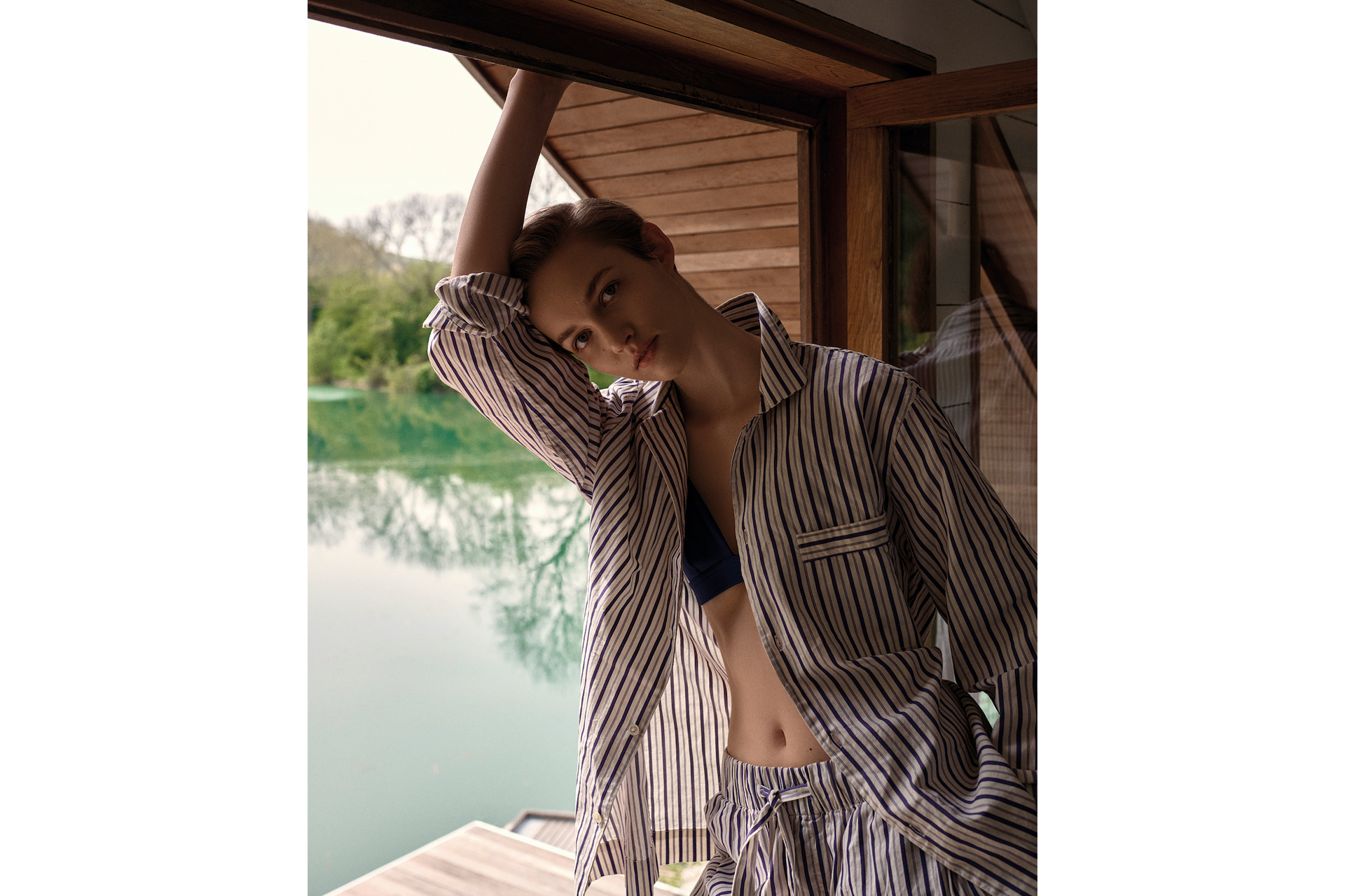 model in bikini top, shirt and shorts in c&th spa shoot