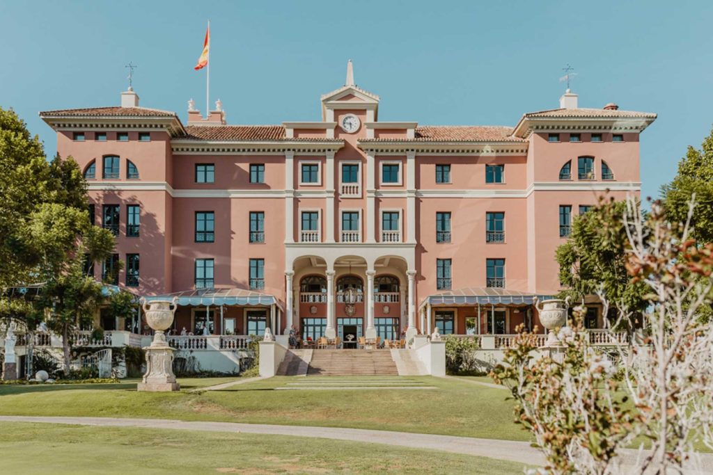 pink hotel facade at Anantara Villa Padierna Palace