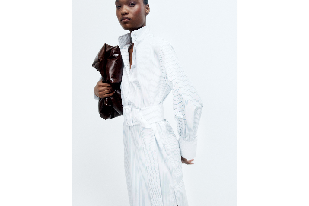 Woman in white shirt dress