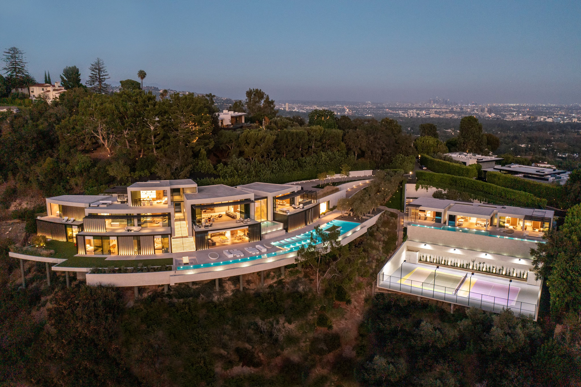 Aerial view of Bel Air mansion on a hillside at dusk