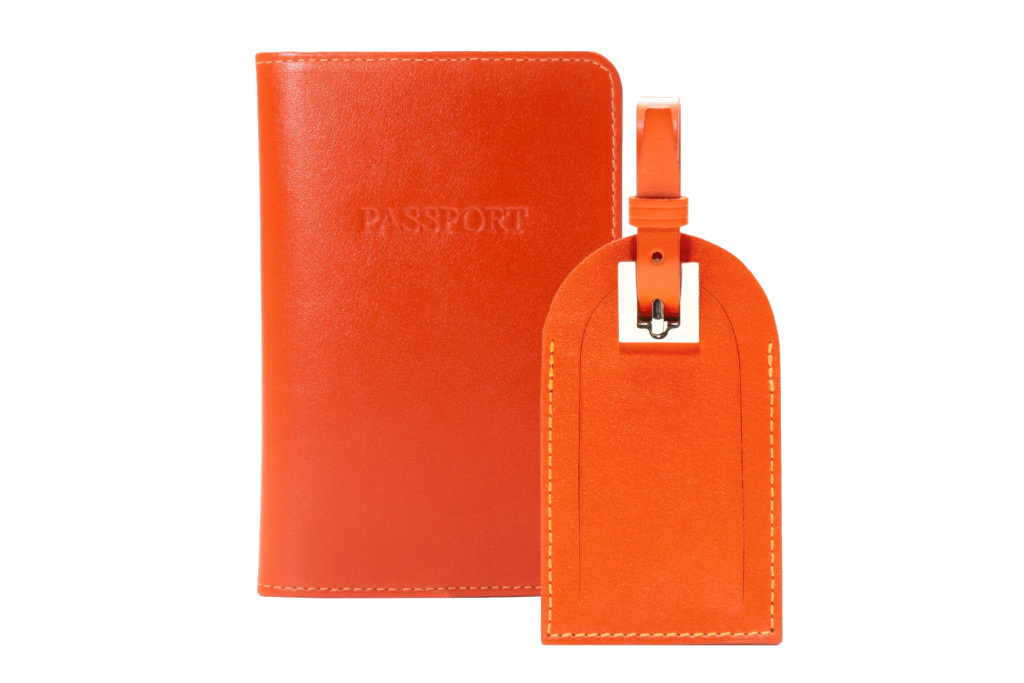 Orange passport holder and luggage tag