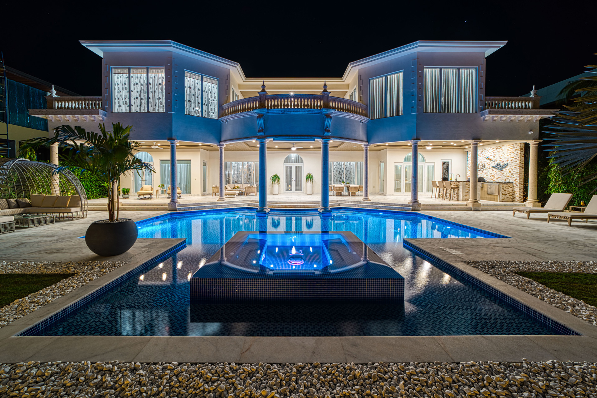 Exterior of grand Florida mansion with pool