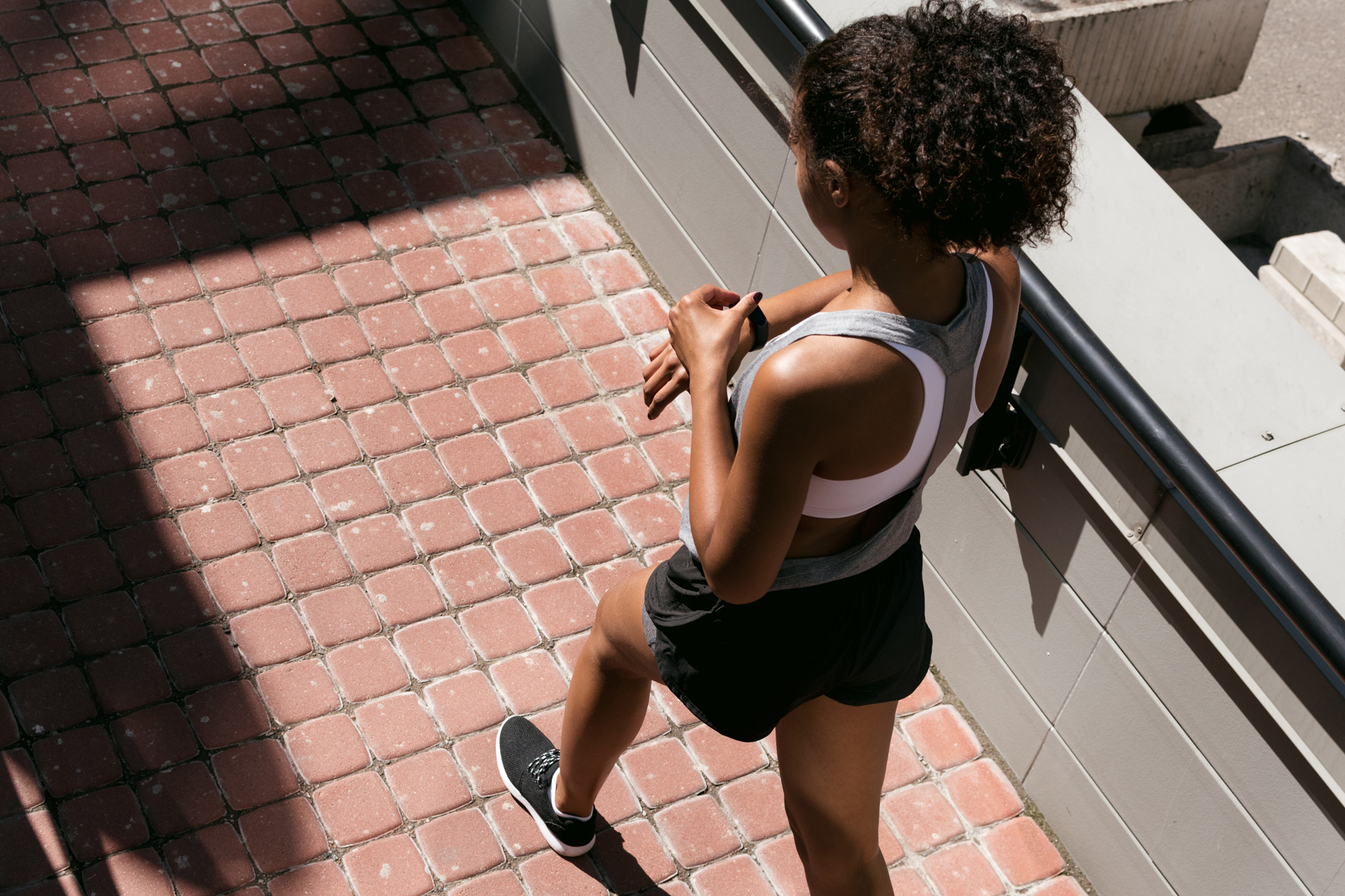 Woman walking with a fitness tracker