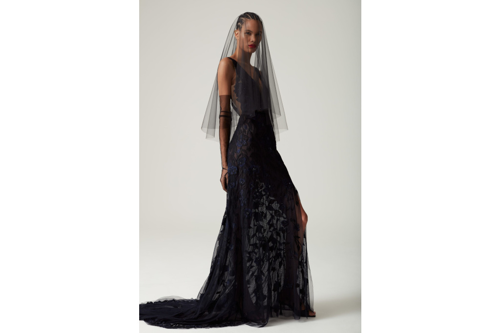 Woman in black wedding dress and veil