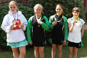 Highfield and Brookham pupils proudly wearing their medals