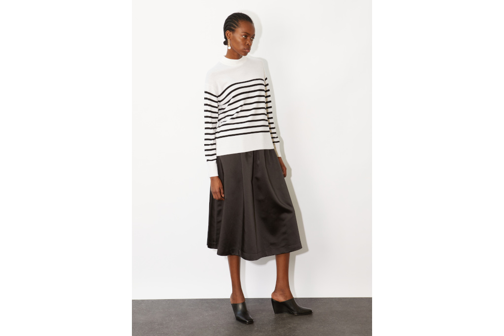 Woman in white Breton stripe jumper
