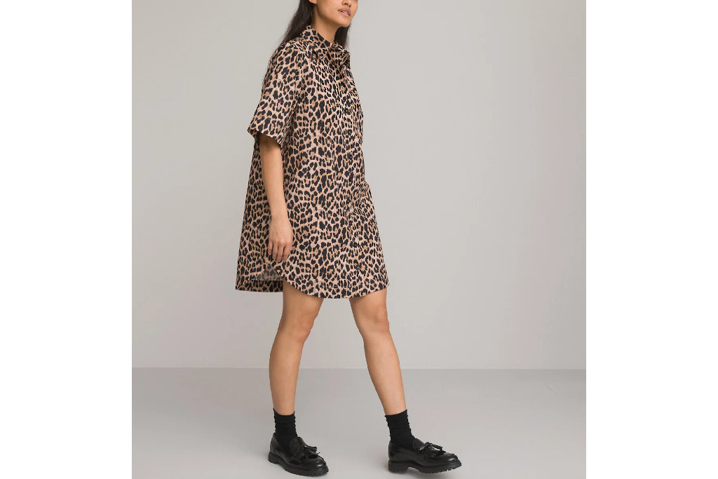Woman in leopard print dress