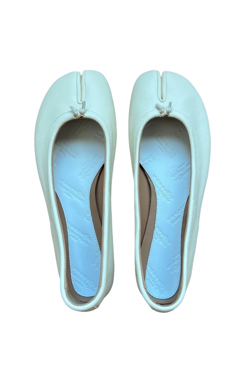 White ballet flats