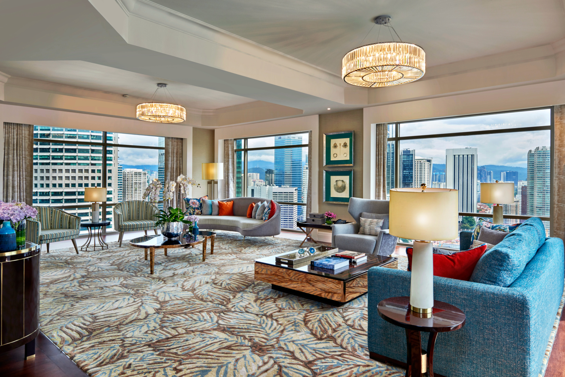 Ornate lounge with large windows overlooking city