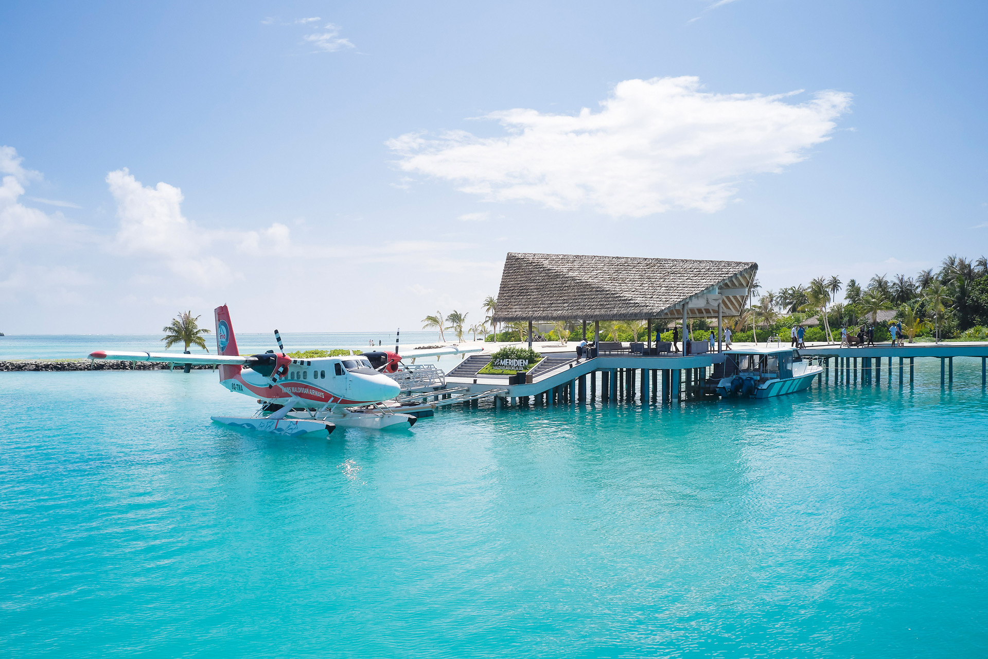 Le Meridien Maldives resort with passenger plane