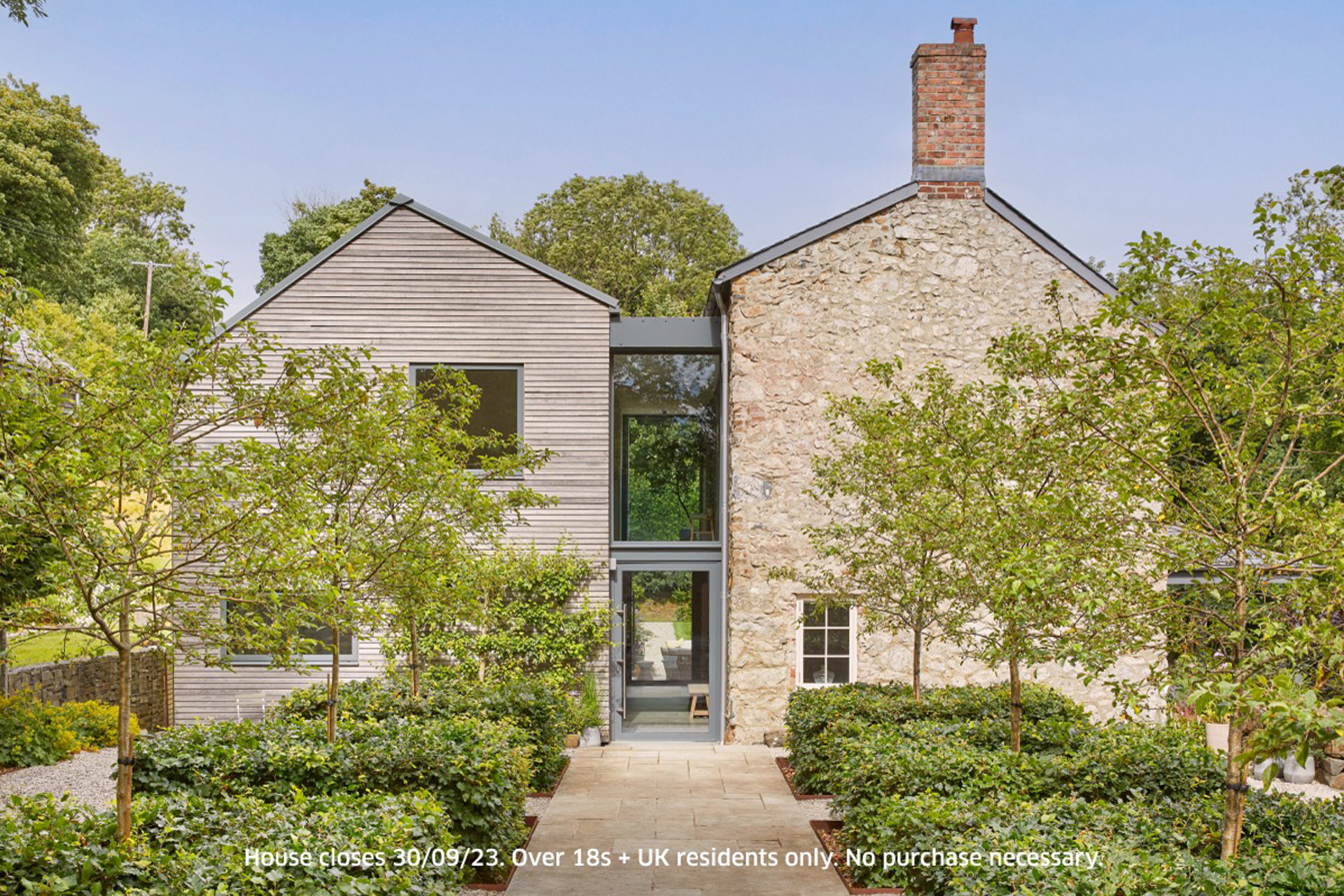 Brick farmhouse with modern extension