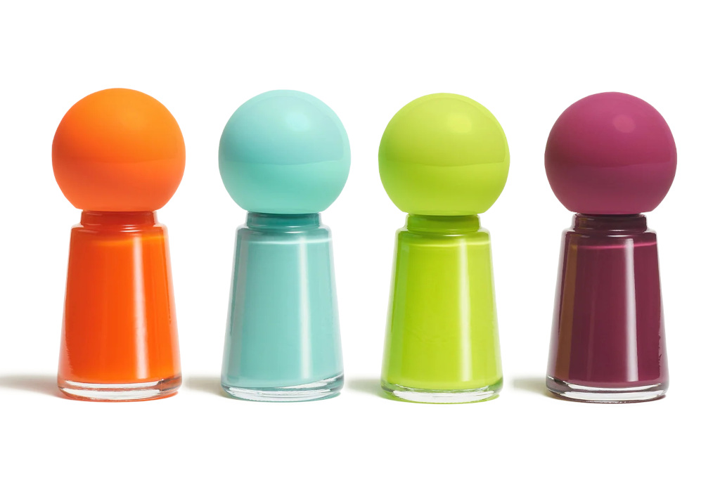 Four colourful nail varnish bottles