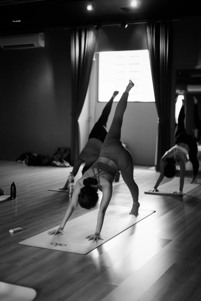 Woman doing hot pilates