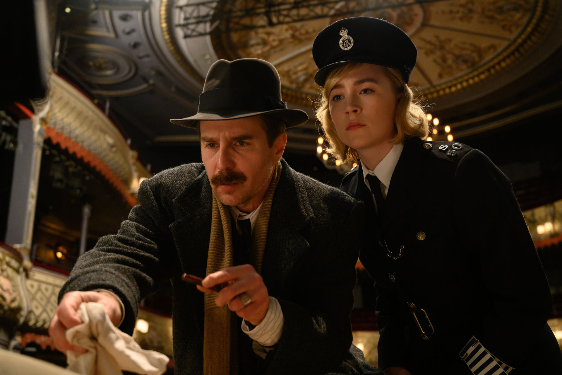 Sam Rockwell and Saoirse Ronan in the film SEE HOW THEY RUN